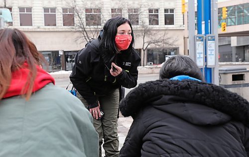 RUTH BONNEVILLE / WINNIPEG FREE PRESS 

LOCAL -  DCSP tour with them. 

Photo of DCSP worker, Jasmine Kodi (red mask) reaching out to connect with people who may need help in the downtown area. 

Story: The Downtown Community Safety Partnership is a relatively new outreach organization that holds patrols in the downtown area. 

Reporter and photog go for walk with some volunteers and capture a snapshot of their work in and around their head office at the Air Canada building on Portage Ave. 

Also, interview with DCSP director, Greg Burnett and with some social workers.  

Malak Abas
Reporter | Winnipeg Free Press

April 15,  2021