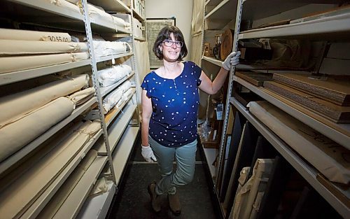 MIKE DEAL / WINNIPEG FREE PRESS
Curator Andrea Reich of the Manitoba Crafts Museum and Library in the vault where hundreds of artifacts are held in storage that have a connection to the founding of this province.
See Brenda Suderman story
210421 - Wednesday, April 21, 2021.