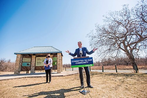 MIKAELA MACKENZIE / WINNIPEG FREE PRESS

Premier Brian Pallister (right) and minister of conservation and climate, Sarah Guillemard, speak to the media about investments in provincial parks at Beaudry Provincial Park on Thursday, April 22, 2021. For Sarah story.
Winnipeg Free Press 2020.