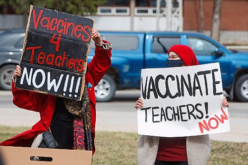 MIKE DEAL / WINNIPEG FREE PRESS
Etty Dallmann (left) and Kara Godin (right) hold signs they made during a protest outside Glenlawn Collegiate Friday afternoon. They are asking the province to immediately vaccinate teachers and school staff throughout Manitoba.
Concerned community members will hold protests demanding vaccines be made available to all teachers and school staff in all regions of Manitoba over the next three weeks to ensure the school system is made safe for the return of students in the fall.
See Katlyn Streilein story
210423 - Friday, April 23, 2021.