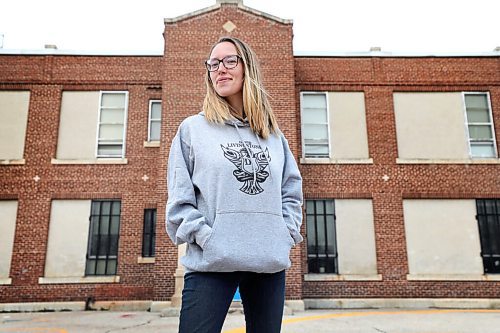 RUTH BONNEVILLE / WINNIPEG FREE PRESS 

Local - Vaccines for teachers 

David Livingstone School grade 1 and two teacher, Melissa Livingstone, is happy to hear she now qualifies to receive the COVID vaccine.  

Photo taken outside  David Livingstone School on Friday. 

April 23,  2021