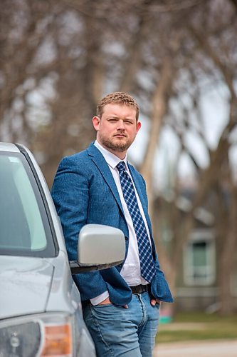 MIKAELA MACKENZIE / WINNIPEG FREE PRESS

Elmwood-Transcona MP Daniel Blaikie poses for a portrait with the minivan he drove from Ottawa in front of his home in Winnipeg on Friday, April 23, 2021. For Dylan story.
Winnipeg Free Press 2020.