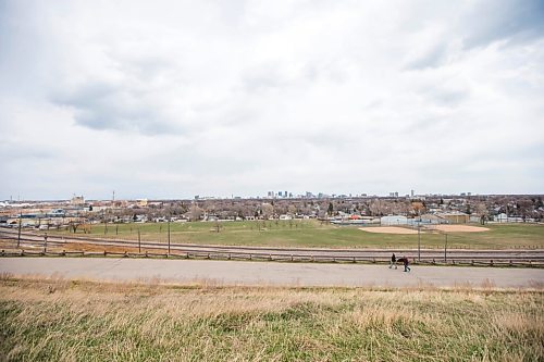 MIKAELA MACKENZIE / WINNIPEG FREE PRESS

Jean and Lisa Neron and their dog, Turk, walk in Westview Park in Winnipeg on Wednesday, April 28, 2021. Standup.
Winnipeg Free Press 2020.