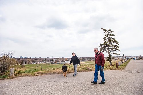 MIKAELA MACKENZIE / WINNIPEG FREE PRESS

Lisa  (left) and Jean Neron and their dog, Turk, walk in Westview Park in Winnipeg on Wednesday, April 28, 2021. Standup.
Winnipeg Free Press 2020.