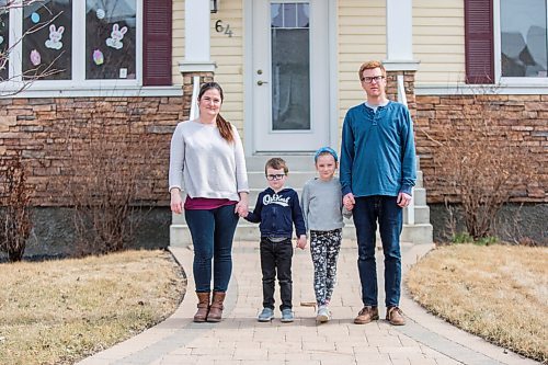 MIKAELA MACKENZIE / WINNIPEG FREE PRESS

Marilyn (left), Jack (five), Julia (seven), and Phil Snarr pose for a portrait in front of their house in Winnipeg on Wednesday, April 28, 2021. Jack has cystic fibrosis, but their family is still not eligible for the vaccine despite his high risk condition. For Kevin story.
Winnipeg Free Press 2020.