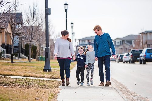 MIKAELA MACKENZIE / WINNIPEG FREE PRESS

Marilyn (left), Jack (five), Julia (seven), and Phil Snarr pose for a portrait on their street in Winnipeg on Wednesday, April 28, 2021. Jack has cystic fibrosis, but their family is still not eligible for the vaccine despite his high risk condition. For Kevin story.
Winnipeg Free Press 2020.