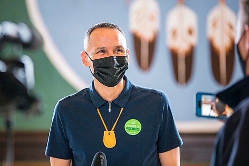 MIKAELA MACKENZIE / WINNIPEG FREE PRESS

Kevin Chief speaks about the experience after getting his COVID-19 vaccine at the Aboriginal Health and Wellness Centre Indigenous immunization clinic in Winnipeg on Thursday, April 29, 2021.
Winnipeg Free Press 2020.