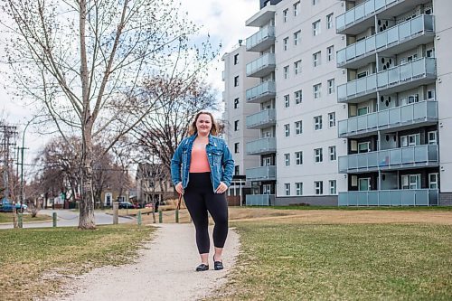 MIKAELA MACKENZIE / WINNIPEG FREE PRESS

Rebecca Driedger, who lives in one of the new high priority neighbourhoods (and is therefore eligible for the vaccine well before she expected to be), poses for a portrait by her apartment building in Winnipeg on Thursday, April 29, 2021. For Malak story.
Winnipeg Free Press 2020.