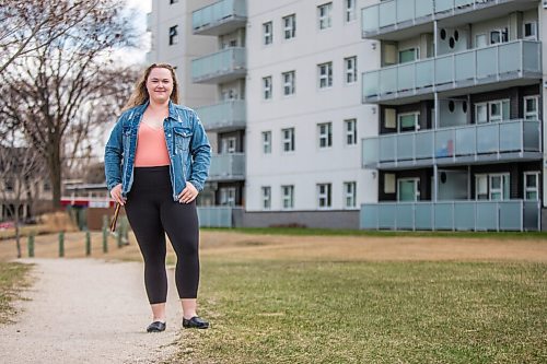 MIKAELA MACKENZIE / WINNIPEG FREE PRESS

Rebecca Driedger, who lives in one of the new high priority neighbourhoods (and is therefore eligible for the vaccine well before she expected to be), poses for a portrait by her apartment building in Winnipeg on Thursday, April 29, 2021. For Malak story.
Winnipeg Free Press 2020.