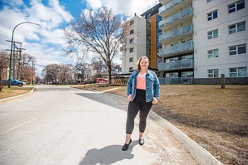 MIKAELA MACKENZIE / WINNIPEG FREE PRESS

Rebecca Driedger, who lives in one of the new high priority neighbourhoods (and is therefore eligible for the vaccine well before she expected to be), poses for a portrait by her apartment building in Winnipeg on Thursday, April 29, 2021. For Malak story.
Winnipeg Free Press 2020.