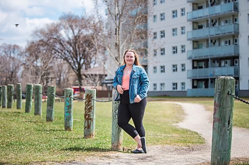 MIKAELA MACKENZIE / WINNIPEG FREE PRESS

Rebecca Driedger, who lives in one of the new high priority neighbourhoods (and is therefore eligible for the vaccine well before she expected to be), poses for a portrait by her apartment building in Winnipeg on Thursday, April 29, 2021. For Malak story.
Winnipeg Free Press 2020.