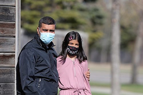 SHANNON VANRAES / WINNIPEG FREE PRESS 
Zahid Abbas and his daughter Kashaf Zahra have been granted permanent resident status in Canada on humanitarian and compassionate grounds. They were photographed near their Winnipeg apartment on April 29, 2021.