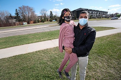 SHANNON VANRAES / WINNIPEG FREE PRESS 
Zahid Abbas and his daughter Kashaf Zahra have been granted permanent resident status in Canada on humanitarian and compassionate grounds. They were photographed near their Winnipeg apartment on April 29, 2021.