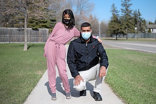 SHANNON VANRAES / WINNIPEG FREE PRESS 
Zahid Abbas and his daughter Kashaf Zahra have been granted permanent resident status in Canada on humanitarian and compassionate grounds. They were photographed near their Winnipeg apartment on April 29, 2021.