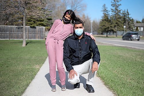 SHANNON VANRAES / WINNIPEG FREE PRESS 
Zahid Abbas and his daughter Kashaf Zahra have been granted permanent resident status in Canada on humanitarian and compassionate grounds. They were photographed near their Winnipeg apartment on April 29, 2021.