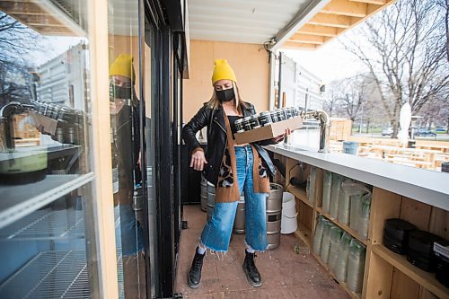 MIKAELA MACKENZIE / WINNIPEG FREE PRESS

Laura Cameron stocks the fridge at the Beer Can by the Granite Curling Club, which will be opening tomorrow, in Winnipeg on Friday, April 30, 2021. Standup.
Winnipeg Free Press 2020.