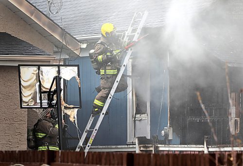 RUTH BONNEVILLE / WINNIPEG FREE PRESS

Local - Fire Standup 

Fire crews knock down a fire at 453 Church Ave. that started in the shed and quickly moved to the home and caused damage to nearby houses on either side of the home Friday.

April 30, 2021