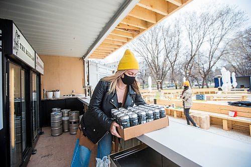 MIKAELA MACKENZIE / WINNIPEG FREE PRESS

Laura Cameron stocks the fridge at the Beer Can by the Granite Curling Club, which will be opening tomorrow, in Winnipeg on Friday, April 30, 2021. Standup.
Winnipeg Free Press 2020.