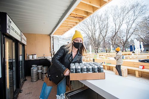 MIKAELA MACKENZIE / WINNIPEG FREE PRESS

Laura Cameron stocks the fridge at the Beer Can by the Granite Curling Club, which will be opening tomorrow, in Winnipeg on Friday, April 30, 2021. Standup.
Winnipeg Free Press 2020.