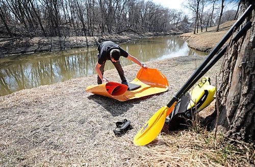 RUTH BONNEVILLE / WINNIPEG FREE PRESS

Local Biz or standup -  Tucktec Foldable Kayak 

With summer just around the corner, local tech company, Alpha Technologies Inc.,  launches a new way to get out onto the water with a foldable kayak by Tucktec,  The Tucktec kayak is light-weight, fits in the trunk of your vehicle and can be assembled in minuets on the shore.  It has a hard plastic shell and liftable rudder that helps it stay balanced and cut through the water with relative ease. Perfect for an afternoon paddle or playing close to shore. 

Photo of Raynald Gobeil, Alpha Graphic Designer, putting together the Tucktec kayak to take it out for a paddle on the Seine River this week. 

APRIL 28, 2001