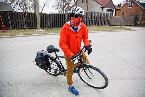 MIKE DEAL / WINNIPEG FREE PRESS
Junel Malapad  an ultra marathoner riding his bike on Scotia Street talks about how he has enjoyed the open streets project in the past.
See Malak Abas story
210430 - Friday, April 30, 2021.