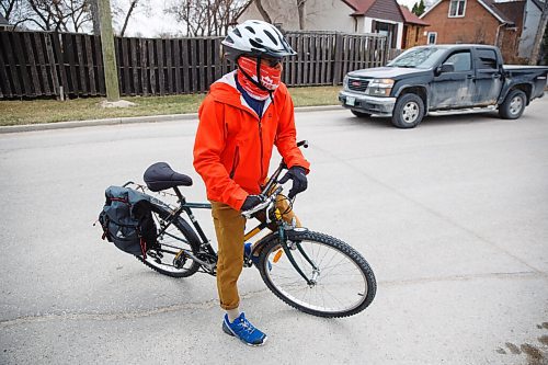 MIKE DEAL / WINNIPEG FREE PRESS
Junel Malapad  an ultra marathoner riding his bike on Scotia Street talks about how he has enjoyed the open streets project in the past.
See Malak Abas story
210430 - Friday, April 30, 2021.