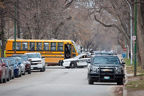 MIKE DEAL / WINNIPEG FREE PRESS
Winnipeg Police at a the scene of a possible gun call on Furby Street Friday afternoon. Furby between Westminster and Wolseley was closed off to all traffic. 
210430 - Friday, April 30, 2021.