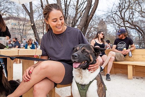 Daniel Crump / Winnipeg Free Press. Ashley Hansen and Titus, an American inu, at the Beer Can on Saturday afternoon. May 1, 2021.