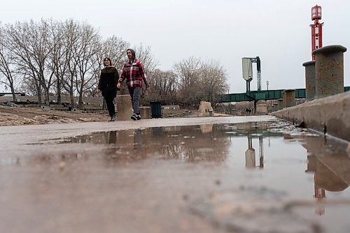 JESSE BOILY  / WINNIPEG FREE PRESS
People take a walk through the Forks despite the wet weather on Sunday. Sunday, May 2, 2021.
Reporter: Standup