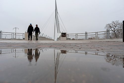 JESSE BOILY  / WINNIPEG FREE PRESS
People take a walk through the Forks despite the wet weather on Sunday. Sunday, May 2, 2021.
Reporter: Standup