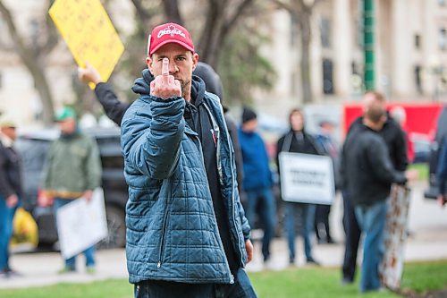 MIKAELA MACKENZIE / WINNIPEG FREE PRESS

Patrick Allard shouts at media at a protest supporting the seven churches fighting pandemic restrictions in court in front of the Law Courts in Winnipeg on Monday, May 3, 2021. For JS story.
Winnipeg Free Press 2020.