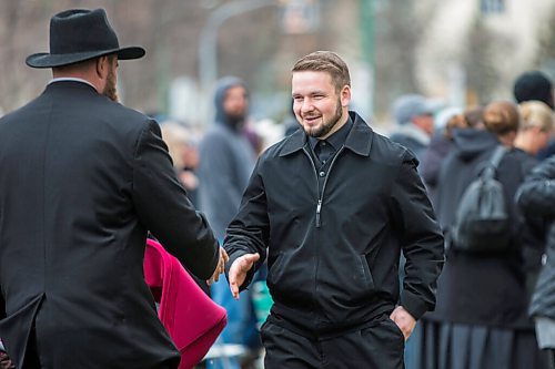 MIKAELA MACKENZIE / WINNIPEG FREE PRESS

Tobias Tissen greets folks at a protest supporting the seven churches fighting pandemic restrictions in court in front of the Law Courts in Winnipeg on Monday, May 3, 2021. For JS story.
Winnipeg Free Press 2020.