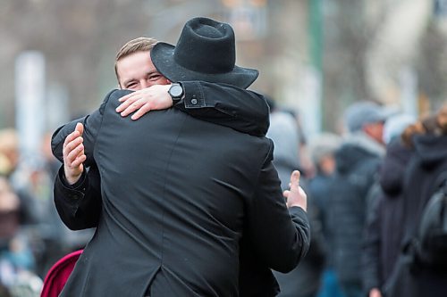 MIKAELA MACKENZIE / WINNIPEG FREE PRESS

Tobias Tissen greets folks at a protest supporting the seven churches fighting pandemic restrictions in court in front of the Law Courts in Winnipeg on Monday, May 3, 2021. For JS story.
Winnipeg Free Press 2020.