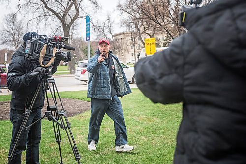 MIKAELA MACKENZIE / WINNIPEG FREE PRESS

Patrick Allard shouts at media at a protest supporting the seven churches fighting pandemic restrictions in court in front of the Law Courts in Winnipeg on Monday, May 3, 2021. For JS story.
Winnipeg Free Press 2020.