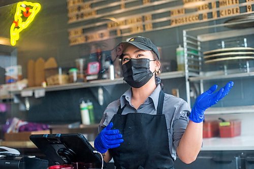 MIKAELA MACKENZIE / WINNIPEG FREE PRESS

Edelma Miranda, co-owner at Wall Street Slice, talks about how street work has affected their business in Winnipeg on Tuesday, May 4, 2021. For Erik Pindera story.
Winnipeg Free Press 2020.