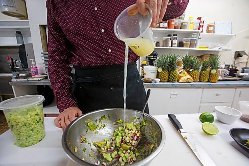 MIKE DEAL / WINNIPEG FREE PRESS
Head chef, Keith Csabak makes guacamole in the kitchen.
The Beer Cantina is a Mexican-inspired food stand offering food made with local ingredients to patrons of the patio. Local chef Keith Csabak is leading the endeavour and there will be more cooks in the kitchen during regular pop-ups. This is a step up from the food truck they partnered with last year.
210504 - Tuesday, May 04, 2021.