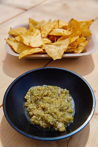 MIKE DEAL / WINNIPEG FREE PRESS
Nachos chips with salsa verde.
The Beer Cantina is a Mexican-inspired food stand offering food made with local ingredients to patrons of the patio. Local chef Keith Csabak is leading the endeavour and there will be more cooks in the kitchen during regular pop-ups. This is a step up from the food truck they partnered with last year.
210504 - Tuesday, May 04, 2021.