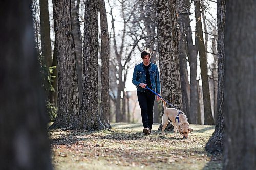 JOHN WOODS / WINNIPEG FREE PRESS
Grant Davidson, aka Slow Leaves, a Winnipeg singer/songwriter and musician walks with his dog Charlie at St. Vital Park Tuesday, May 4, 2021. 

Reporter: Small
