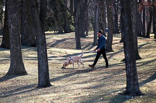 JOHN WOODS / WINNIPEG FREE PRESS
Grant Davidson, aka Slow Leaves, a Winnipeg singer/songwriter and musician walks with his dog Charlie at St. Vital Park Tuesday, May 4, 2021. 

Reporter: Small
