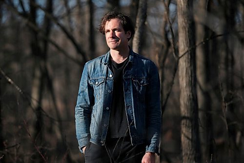 JOHN WOODS / WINNIPEG FREE PRESS
Grant Davidson, aka Slow Leaves, a Winnipeg singer/songwriter and musician walks with his dog Charlie at St. Vital Park Tuesday, May 4, 2021. 

Reporter: Small
