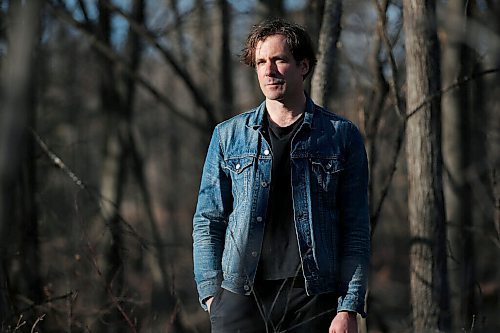 JOHN WOODS / WINNIPEG FREE PRESS
Grant Davidson, aka Slow Leaves, a Winnipeg singer/songwriter and musician walks with his dog Charlie at St. Vital Park Tuesday, May 4, 2021. 

Reporter: Small
