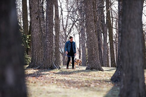 JOHN WOODS / WINNIPEG FREE PRESS
Grant Davidson, aka Slow Leaves, a Winnipeg singer/songwriter and musician walks with his dog Charlie at St. Vital Park Tuesday, May 4, 2021. 

Reporter: Small
