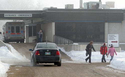 Brandon Sun Students on a school bus involved in an early morning accident were released from Neepawa Health Centre to their parents following observation at emergency room on Wednesday morning.  (Bruce Bumstead/Brandon Sun)