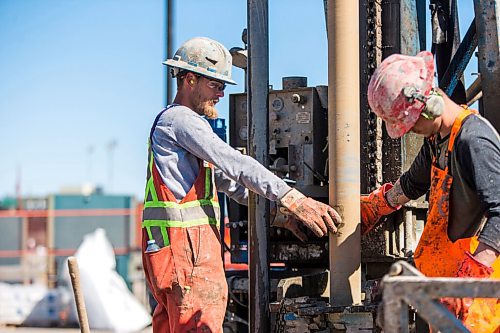 MIKAELA MACKENZIE / WINNIPEG FREE PRESS

Adam Zurbyk (left) and Dylan Goertzen work on drilling holes for a geothermal energy system at The Forks in Winnipeg on Wednesday, May 5, 2021. For Sarah story.
Winnipeg Free Press 2020.