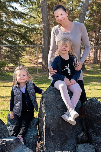JESSE BOILY  / WINNIPEG FREE PRESS
Jennifer Oldfield and her daughters, Audrey, 4, and Charlotte, 6, pose for a portrait outside their Oak Bluff home on Wednesday. Jennifer has been navigating the challenges of being a mother and a teacher throughout the pandemic. Wednesday, May 5, 2021.
Reporter: Jen Zoratti