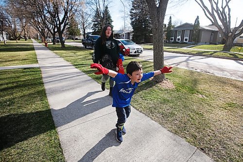 JOHN WOODS / WINNIPEG FREE PRESS
Kisa MacIsaac, an early childhood educator and mother of three, walks with her son Kalvin to his soccer game Wednesday, May 5, 2021. MacIsaac works in a daycare full-time and with three children has had a difficult time maintaining a balance during the pandemic.

Reporter: Wasney
