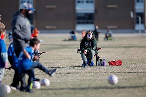 JOHN WOODS / WINNIPEG FREE PRESS
Kisa MacIsaac, an early childhood educator and mother of three, watches her son Kalvin at his soccer game Wednesday, May 5, 2021. MacIsaac works in a daycare full-time and with three children has had a difficult time maintaining a balance during the pandemic.

Reporter: Wasney
