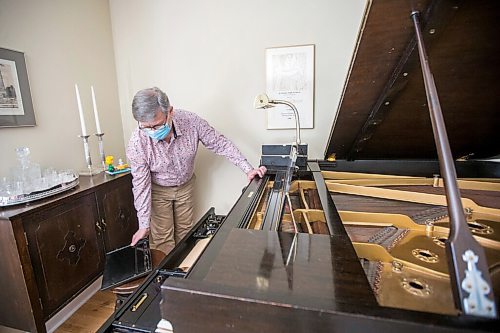 MIKAELA MACKENZIE / WINNIPEG FREE PRESS

Andrew Thomson, player piano collector and restorer, shows off the reproducing grand piano in his home in Winnipeg on Thursday, May 6, 2021. For Holly Harris story.
Winnipeg Free Press 2020.