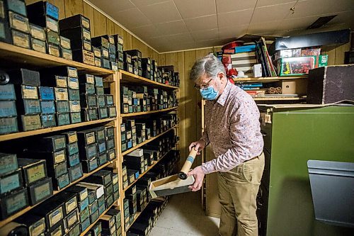 MIKAELA MACKENZIE / WINNIPEG FREE PRESS

Andrew Thomson, player piano collector and restorer, shows his collection of scrolls in his home in Winnipeg on Thursday, May 6, 2021. For Holly Harris story.
Winnipeg Free Press 2020.