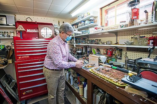 MIKAELA MACKENZIE / WINNIPEG FREE PRESS

Andrew Thomson, player piano collector and restorer, poses for a photo in his workshop in his home in Winnipeg on Thursday, May 6, 2021. For Holly Harris story.
Winnipeg Free Press 2020.